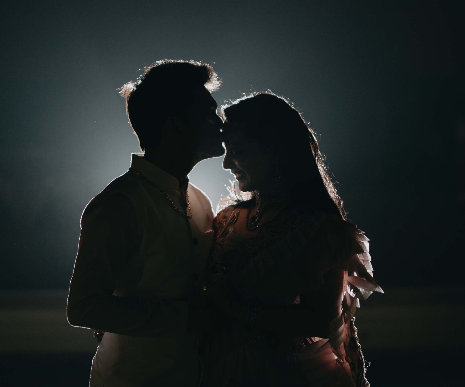Couple photographed in a cinematic silhouette